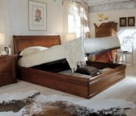 Beds with lifting mechanism